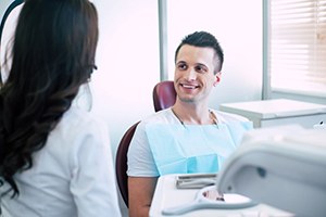 Dentist and patient having a conversation