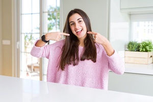 Young woman enjoying the benefits of dental bonding