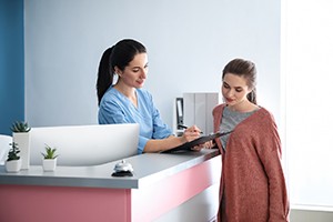 Patient learning about payment options for full mouth reconstruction