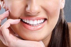 Close-up of woman’s beautiful smile with porcelain veneers