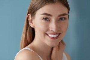 Woman with radiant smile after free teeth whitening in Belmont