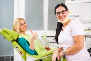 Happy patient at appointment to use dental insurance in Belmont