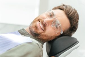 Smiling middle-aged male dental patient
